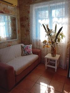 Posedenie v ubytovaní Lithos stone house (Ionio holidays)