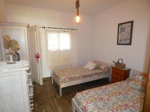 Posteľ alebo postele v izbe v ubytovaní Mis Tres Rosas + 31 fotografií