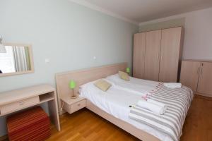 Postel nebo postele na pokoji v ubytování Apartment Ana