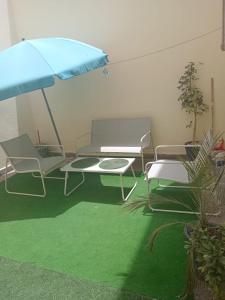 Κήπος έξω από το Élégant Appartement près grand bazar "Souk elhad"