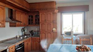 Η κουζίνα ή μικρή κουζίνα στο CASA DO AVÒ