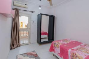 Ένα ή περισσότερα κρεβάτια σε δωμάτιο στο Madares sweet home appartment