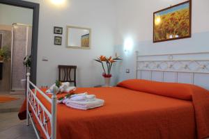 A bed or beds in a room at B&B Is Janas E5391