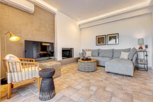Posezení v ubytování Agios Stefanos Bay - Villa Dimitris