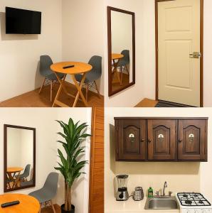 una cocina con una mesa y un espejo y una mesa en Habitaciones Sancris, en San Cristóbal de Las Casas
