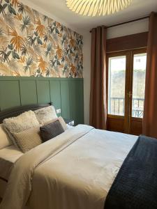 Postel nebo postele na pokoji v ubytování Casa Valvanera