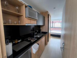 Η κουζίνα ή μικρή κουζίνα στο Apartamento en Bogota con Piscina
