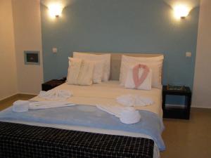 Postel nebo postele na pokoji v ubytování Hotel Wellness & Spa Angelo Gabriel