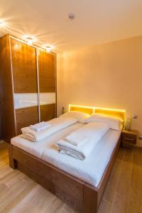 Postel nebo postele na pokoji v ubytování Luxusní Vinařská Villa