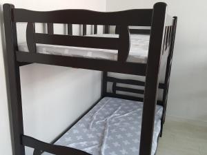 Postel nebo postele na pokoji v ubytování Guest House Manna