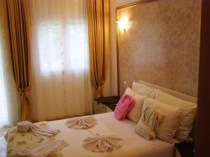 Postel nebo postele na pokoji v ubytování Hotel Wellness & Spa Angelo Gabriel