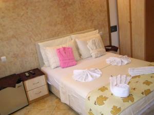 Postel nebo postele na pokoji v ubytování Hotel Wellness & Spa Angelo Gabriel