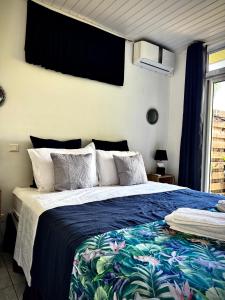 Postel nebo postele na pokoji v ubytování Le Refuge Tere-Rai - chambre + 7 fotografií