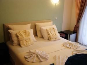 Postel nebo postele na pokoji v ubytování Hotel Wellness & Spa Angelo Gabriel