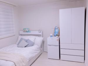 Postel nebo postele na pokoji v ubytování Rapym Coliving House