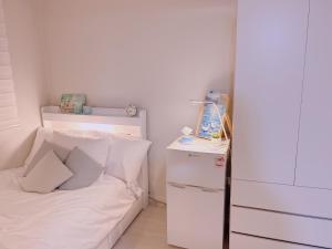 Postel nebo postele na pokoji v ubytování Rapym Coliving House