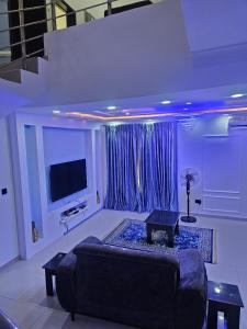 TV a/nebo společenská místnost v ubytování ambiance abodes