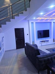 TV a/nebo společenská místnost v ubytování ambiance abodes + 5 fotografií