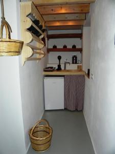 A kitchen or kitchenette at Lindos Esel Suites