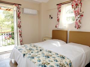 Ένα ή περισσότερα κρεβάτια σε δωμάτιο στο Villa Xanthos 301 +42 φωτογραφίες