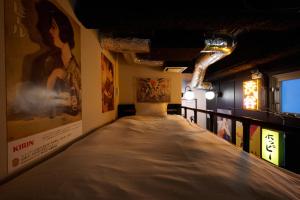 a room with a large mattress on the floor at Blossom House Shibuya in Tokyo