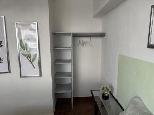 Ένα ή περισσότερα κρεβάτια σε δωμάτιο στο Confortable depa cerca de Expo Guadalajara