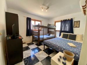 Voodi või voodid majutusasutuse Casa Nordica - Rooms, Camping, Hammocks toas