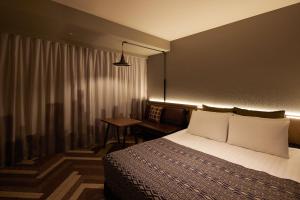 Voodi või voodid majutusasutuse SHIBUYA STREAM HOTEL formerly Shibuya Stream Excel Hotel Tokyu toas