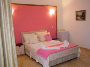 Postel nebo postele na pokoji v ubytování Hotel Wellness & Spa Angelo Gabriel