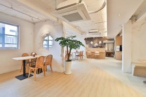 Kuchyň nebo kuchyňský kout v ubytování Ulsan Samsan CUSTOM HOTEL