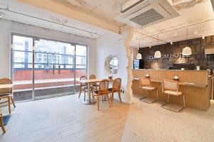Kuchyň nebo kuchyňský kout v ubytování Ulsan Samsan CUSTOM HOTEL