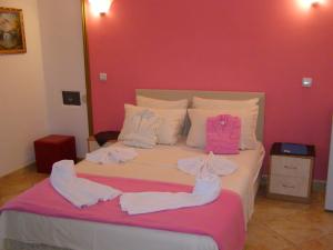 Postel nebo postele na pokoji v ubytování Hotel Wellness & Spa Angelo Gabriel