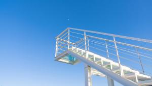 a metal ladder on top of a building at Gangneung Pension G7 Spa Pension in Gangneung +68 photos