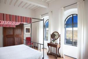 Ένα ή περισσότερα κρεβάτια σε δωμάτιο στο Agriturismo Borgo Personatina +104 φωτογραφίες