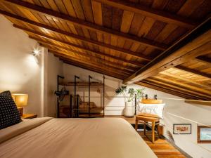 Ένα ή περισσότερα κρεβάτια σε δωμάτιο στο Bisma Apartment Canggu