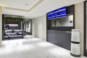 TV a/nebo společenská místnost v ubytování Daejeon Just Sleep Hotel Daejeon Dunsan Branch