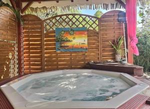 Mynd úr myndasafni af Gîte Orchidée piscine commune í Saint-François