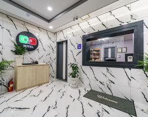 TV a/nebo společenská místnost v ubytování On and Off Hotel Incheon Sungeui Station Branch