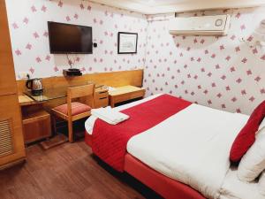 Letto o letti in una camera di Hotels Daffodils