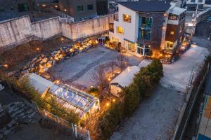 an overhead view of a wedding venue with lights at Nami Island Koi Pension in Gapyeong +1 photo
