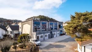 an aerial view of a building with a sign on it at Gyeongju Bomun Arno Pet-friendly Pool Villa in Mulch'ŏn