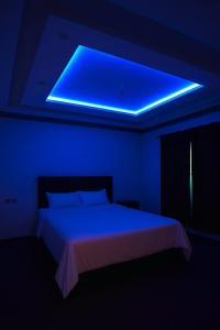 Aba-SHAH GUEST HOUSE SKARDU客房内的一张或多张床位