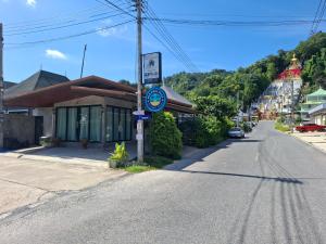 an empty street in a small town with a building at Peaceful Pool Villa 1 in Ao Nang Beach