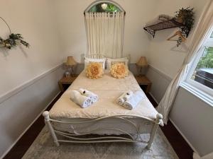 Katil atau katil-katil dalam bilik di Celestial Dew Guesthouse in Tyalgum