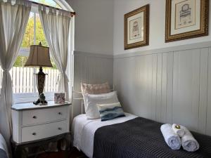 Katil atau katil-katil dalam bilik di Celestial Dew Guesthouse in Tyalgum