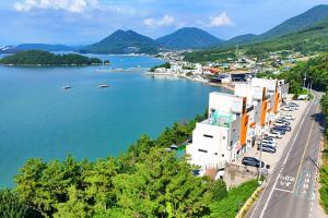 a view of a town and a body of water at Yeosu Bokja Pension in Yeosu