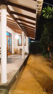 Kawasan patio atau luaran di Suvasam Negombo Beach House