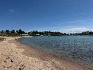 a view of a beach with the water at Иззат in Akchiy