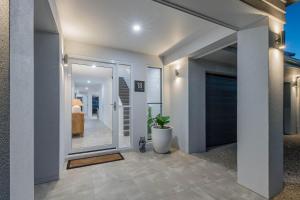 Φωτογραφία από το άλμπουμ του Cove 18 - Luxury beach house σε Airlie Beach