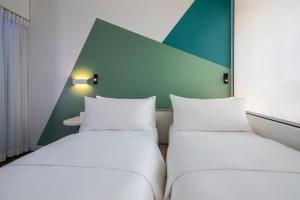 Tru by Hilton Bac Giang City Centre客房内的一张或多张床位